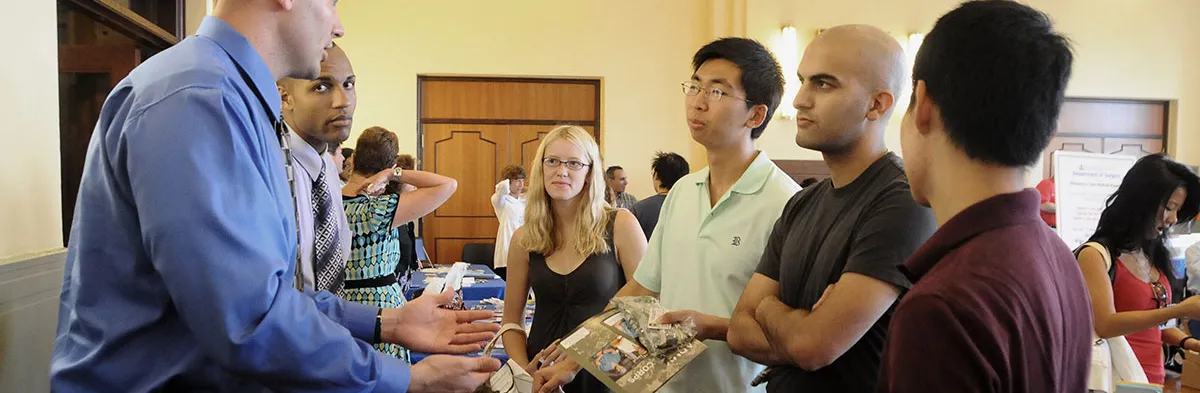Students Looking at a board