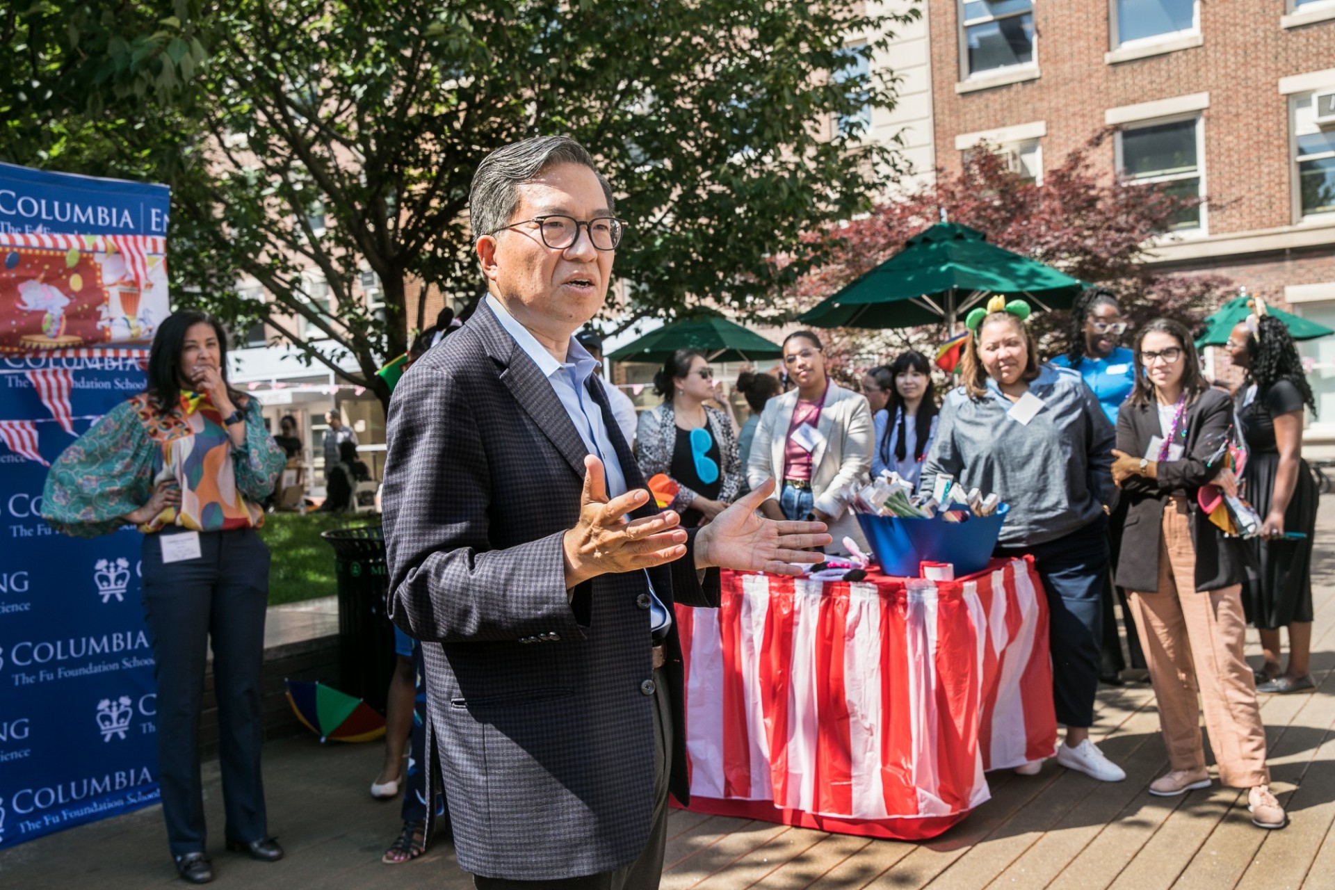 Dean Chang giving speech to staff 