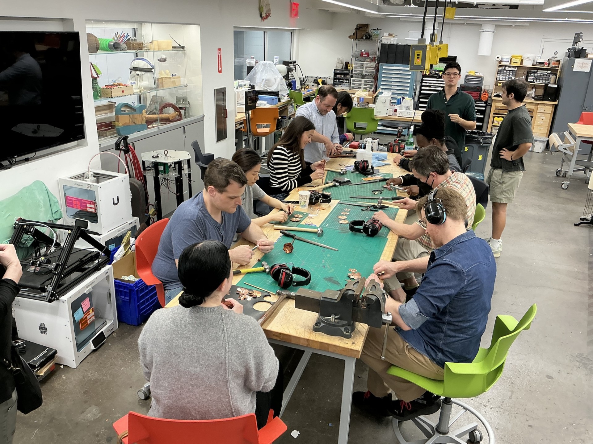 Columbia Engineering staff working on their copper roses in the Makerspace @ Columbia