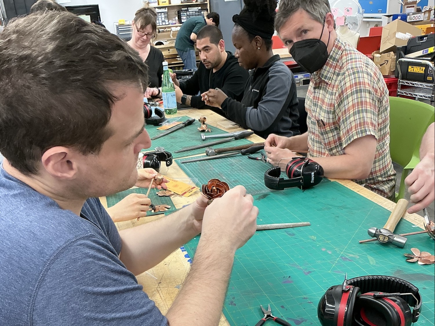 Columbia Engineering staff working on their copper roses in the Makerspace @ Columbia