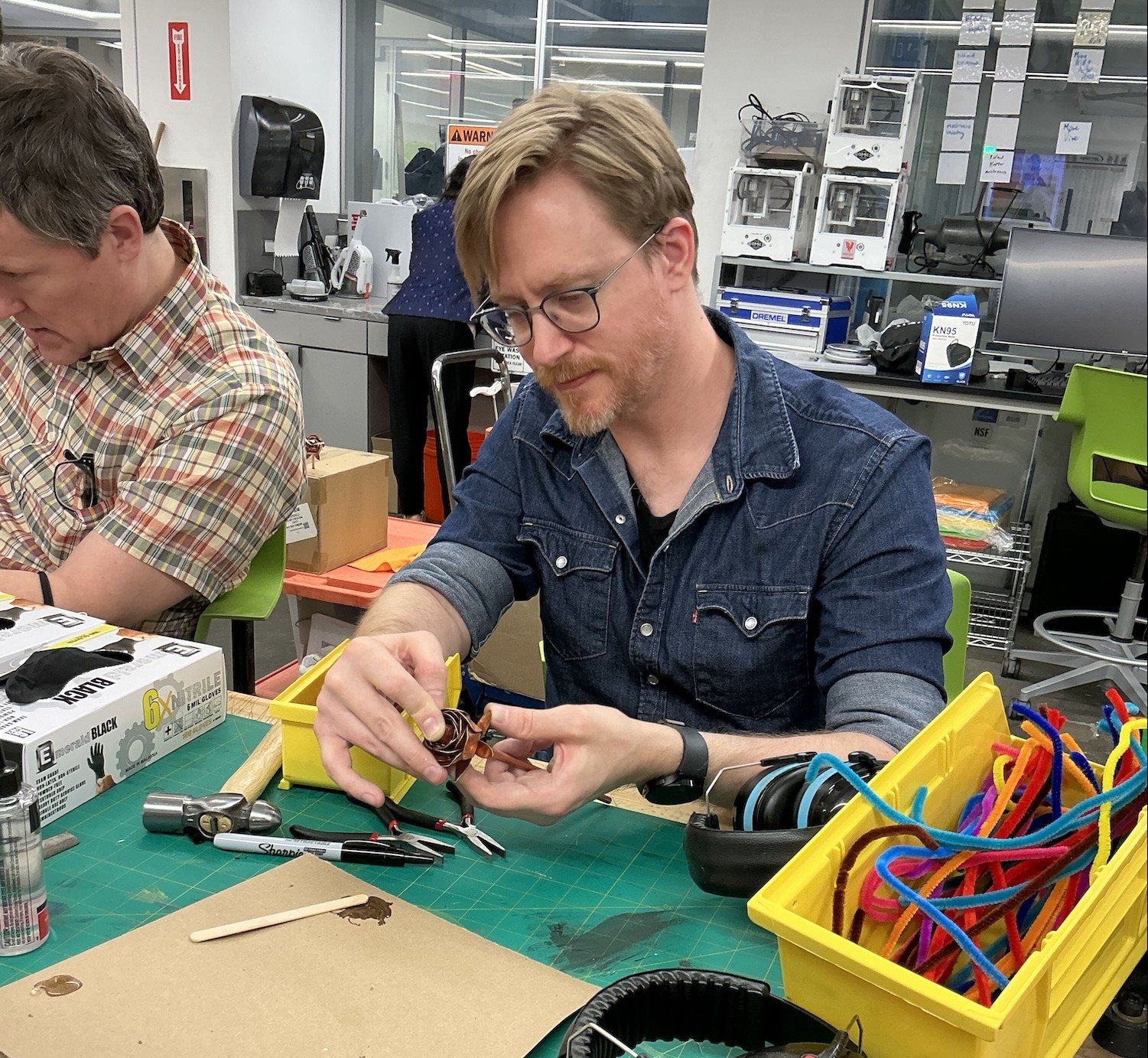 A Columbia Engineering staff member working on their copper rose