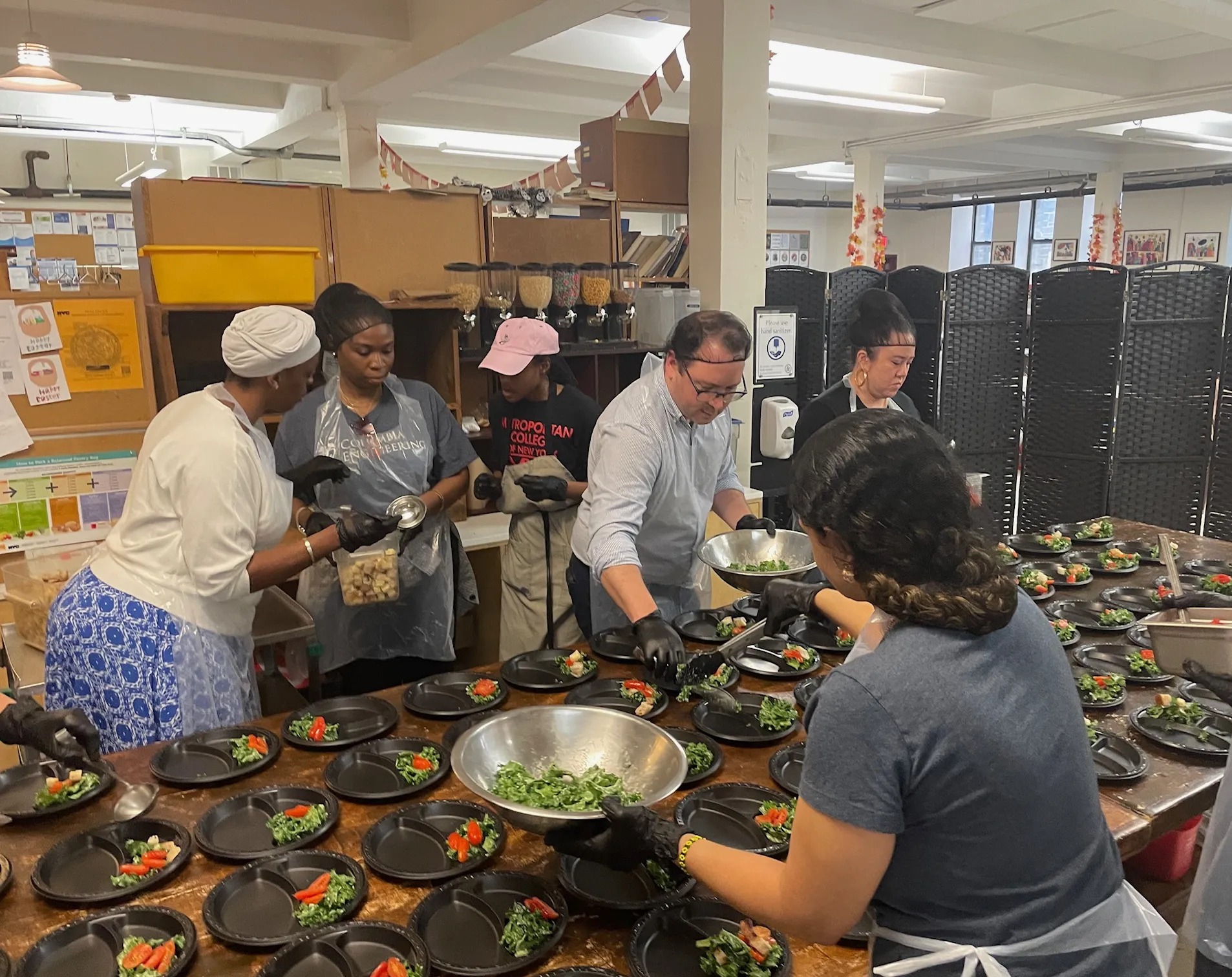 Columbia Engineering staff preparing food together