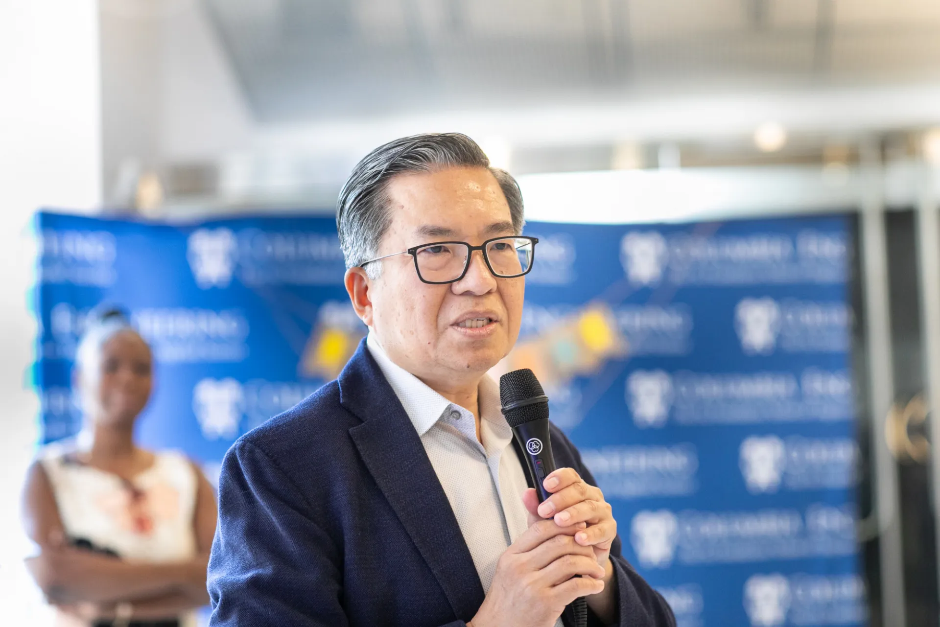 Dean giving speech to staff
