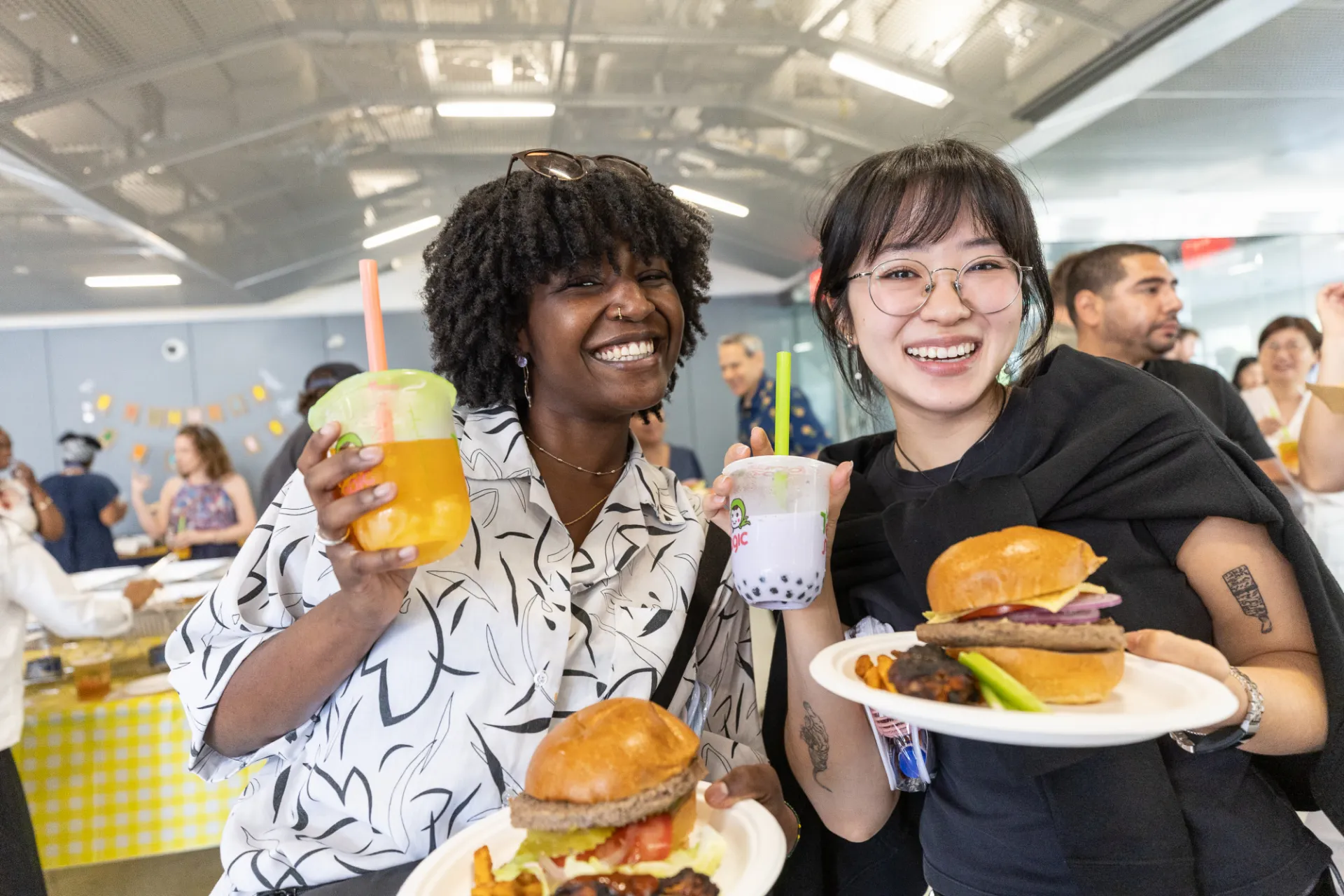 Staff members enjoying food and boba tea