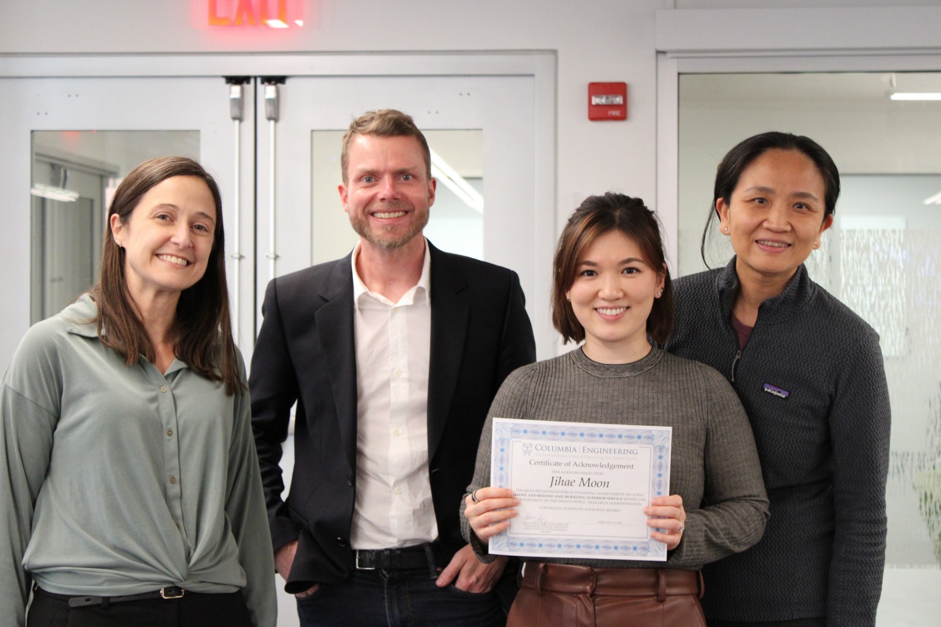 Jihae Moon holding her certificate of Acknowledgement from Columbia Engineering alongside LEAP staff.